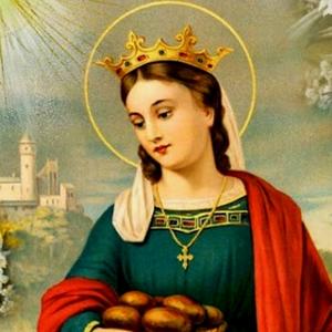 Imagem de Santa Isabel da Hungria vestida como Rainha e com um crucifixo no peito... Leva um prato com alguns pães