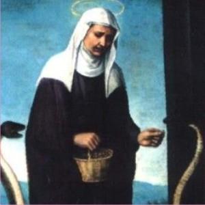 Imagem de Santa Veridiana em sua cela com roupas de religiosa (hábito negro e véu branco). Está com uma caldeirinha nas mãos entre duas cobras que podem representar seus tormentos malignos sobrenaturais